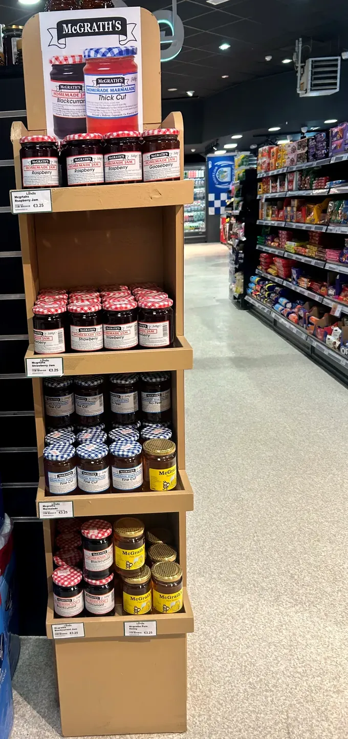 The McGrath’s display stand in a Londis shop, stacked with raspberry, strawberry and blackcurrant jams, marmalades and honey